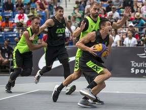 Team Liman Stefan Kojic drives the ball Team Novi Sad Dusan Bulut in the final game of the FIBA 3x3 World Tour Saskatoon Masters in Saskatoon, SK on Sunday, July 22, 2018. Team Novi Sad defeated Team Liman.