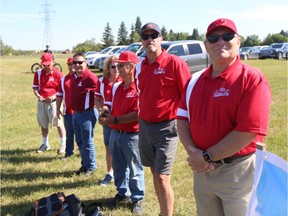 Optimist Club members celebrate the ground breaking for the new Optimist Hill recreational park on July 13.