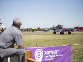 SASKATOON,SK--JULY 17 0717-NEWS-Ag in motion- an attendant watch a demonstration during the annual Ag in Motion agricultural event with more than 400 ag related businesses taking part outside Saskatoon, SK on Tuesday, July 17, 2018.