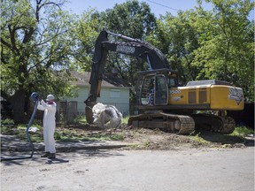 SASKATOON,SK--JULY 16 9999-NEWS-ASBESTOS HOUSE- Demolition of a house on Avenue B that caused concerns in the neighbourhood due to signs warning about the presence of asbestos was finally completed on Monday in Saskatoon, SK on Monday, July 16, 2018.