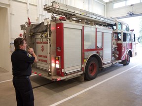 A fire department crew backs a fire engine into the new Fire Station No. 3 on Clarence Avenue on Wednesday, July 18, 2018