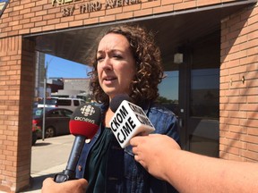 Saskacthewan NDP Justice Critic speaks to reporters outside Saskatoon provincial court on Mon., July 23.