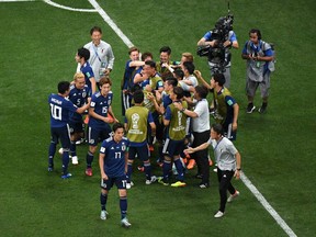 ROSTOV-ON-DON, RUSSIA - JULY 02:  Takashi Inui of Japan celebrates with teammates after scoring his team's second goal during the 2018 FIFA World Cup Russia Round of 16 match between Belgium and Japan at Rostov Arena on July 2, 2018 in Rostov-on-Don, Russia.