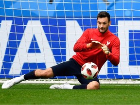 France's goalkeeper Hugo Lloris jumps to catch the ball during a training session of France's national football team at the Saint Petersburg Stadium, in Saint Petersburg, on July 9, 2018, on the eve of their Russia 2018 World Cup semi-final football match against Belgium.