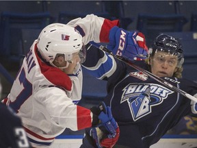Riley McKay, shown here battling against the Saskatoon Blades, is the newest member of the Blades following a trade with the Spokane Chiefs.