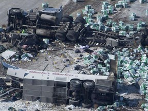 A lawsuit filed this week by the parents of one of the Humboldt Broncos players killed in a collision this past April has asked for a court order requiring all buses carrying sports teams to be equipped with seatbelts and other safety devices. The wreckage of a fatal crash outside of Tisdale, Sask., is seen Saturday, April, 7, 2018.