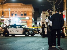 Toronto Police Chief Mark Saunders and Mayor John Tory speak following Sunday night's shooting in downtown Toronto.