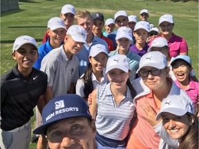 Graham DeLaet poses for a selfie with a group of junior golfers who will play in the second annual DeLaet Cup featuring golfers from across Canada representing the East and West in a Ryder Cup-style format.