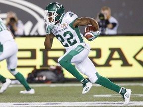 The Saskatchewan Roughriders' Christion Jones takes off on a 61-yard punt-return touchdown Thursday against the Hamilton Tiger-Cats.