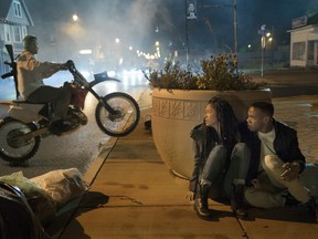 This image released by Universal Pictures shows Lex Scott Davis and Joivan Wade, right, in a scene from "The First Purge."