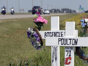 Monuments including crosses and flowers stand in the ditch near accident sites on the #6 highway south of Regina, SK. on Friday, August 23, 2013.