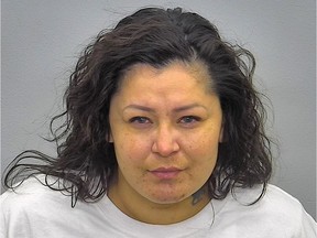 This photo provided by the Burleigh-Morton County Detention Center in Bismarck, N.D., shows Red Fawn Fallis, of Denver. Fallis, who accused of shooting at officers during protests in North Dakota against the Dakota Access oil pipeline in 2016 is scheduled to be sentenced Wednesday afternoon, July 11, 2018, in Bismarck. She pleaded guilty in January to civil disorder and a weapons charge. Prosecutors are recommending seven years in prison, though federal Judge Daniel Hovland can go up to 15 years.