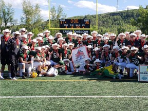 Team Saskatchewan celebrates a gold-medal victory at the Football Canada Cup on Sunday in Calgary.