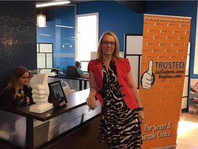 Sara Wheelwright is pictured inside of the new office of TrustedSaskatoon located on the fifth floor of 129 21st Street East in Saskatoon on July 13, 2018. (Erin Petrow/Saskatoon StarPhoenix)