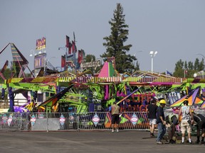 SASKATOON,SK--AUGUST 06/2018-0807 Standalone Ex Set Up- Workers at the Saskatoon Ex in Prairieland Park in Saskatoon, SK on Monday, August 6, 2018.