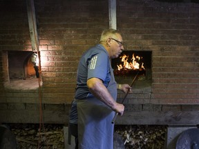 SASKATOON,SK--AUGUST 07 9999-NEWS-Ex food- Harvey Kazakoff helps make Doukhobor bread at the Saskatoon Ex in Saskatoon, SK on Tuesday, August 7, 2018.