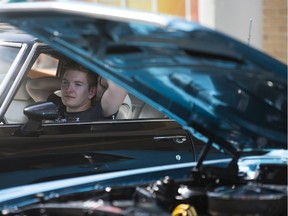 Kyle Daschuk sits in his Buick GS during the Show & Shine car show where 1,000 classic cars were on display in downtown Saskatoon on Sunday, August 19, 2018.