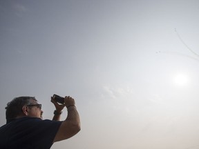 Toby Boulet, father of Logan Boulet who died after the April 6 Humboldt Broncos bus crash that killed 16 and received the Angel's Legacy Humanitarian Award on behalf of his son, watches a fly over by Snowbirds in Humboldt, SK on Thursday, August 23, 2018. The award was renamed in Logan's name to the Logan Boulet Humanitarian Award for inspiring a movement for people in Canada and beyond to register as organ donors.