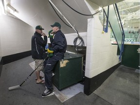 Scott Barney, shown here (right) under the Elgar Petersen Arena stands during training camp, has taken over as the interim head coach of the Humboldt Broncos