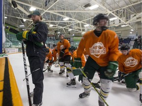 Humboldt Bronco head coach Nathan Oystrick, left, during the first day of training camp at Elgar Petersen Arena in Humboldt on Friday, August 24, 2018.