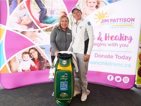 Lynn Redl-Huntington, left, vice-president of communications with the Jim Pattison Children's Hospital Foundation, alongside professional golfer Alena Sharp, as she donates a Humboldt Broncos-themed golf bag to the foundation in late August. She used the bag during her recent showing at the CP Women's Open and said it helped her gain some perspective on life as an athlete and person.