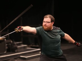 Jordie Richardson lunges with his sword at the Fight Directors Canada national certification conference in Saskatoon on August 29, 2018.