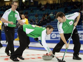 Curl Saskatoon has submitted a bid to host the 2021 Olympic curling trials at SaskTel Centre. In this March 8, 2012 photo, skip Scott Manners of Saskatchewan, with sweepers Mike Armstrong, left, and Ryan Deis, compete at the 2012 Brier in Saskatoon.