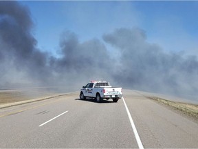 A file photo of RCMP on the scene of a fire