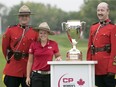 Brooke Henderson dons a Mountie's hat after winning the LPGA's CP Women's Open on Sunday at the Wascana Country Club.