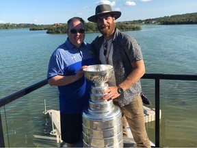 Saskatoon Blades associate general manager Steve Hildebrand gets reunited with former Blades goalie Braden Holtby, who won the Stanley Cup with the Washington Capitals. They are shown here posing together at Holtby's summer cottage in the Lloydminster area.