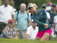 American Jessica Korda chips out of the bunker on the 9th hole during the CP Women's Open at the Wascana Country Club in Regina.