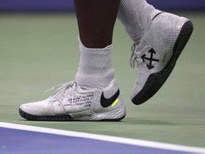 Serena Williams walks behind the baseline during a first-round match against Magda Linette, of Poland, at the U.S. Open tennis tournament, Monday, Aug. 27, 2018, in New York.