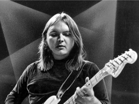 This 1975 file photo shows guitarist Ed King of the Southern rock band Lynyrd Skynyrd. A family statement said King, who helped write several of their hits including "Sweet Home Alabama," died from cancer, Wednesday, Aug. 22, 2018, in Nashville, Tenn. He was 68.