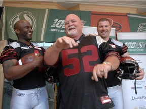 Jim Hopson, centre, is shown modelling the Saskatchewan Roughriders' retro jerseys in 2010 alongside Darian Durant, left, and Chris Szarka. Hopson and Szarka are now in the Plaza of Honour, and Durant is a sure bet.