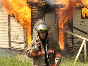 The Saskatoon Fire Department conducts a controlled burn just south of the city on Preston Avenue in an old farmyard in 2006.