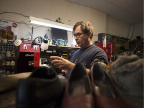 Tibor Marki, co-owner of Downtown Tailor & Shoe Repair shines a shoe in his shop in Saskatoon, SK on Friday, September 7, 2018.