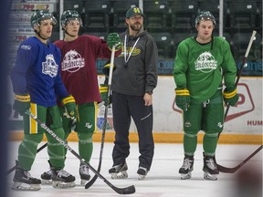 Humboldt Broncos' head coach Nathan Oystrick says bus-crash survivors Brayden Camrud (left) and Derek Patter (right) are "both special, special people."