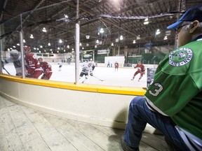 University of Saskatchewan Huskies fan Gordon Panchuk watches as his team takes on the York University Lions during the first period of pre-season CIS Men's Hokey action at Rutherford Rink in Saskatoon, SK on Sunday, September 23, 2018. The pre-season game, played in honour of Mark Cross, the Humboldt Broncos assistant coach who was killed in the April 6 bus crash, is also the last game to be played at Rutherford Rink.