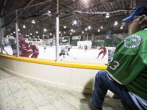 U of S Huskies hockey fan Gordon Panchuk watches the final game at Rutherford Rink.