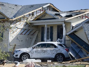 Houses on Porcupine Trail and Casey Creek Lane in Dunrobin were severly damaged by Friday's tornado. James Park/Postmedia