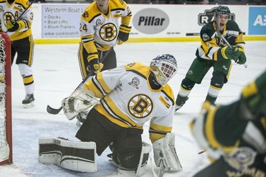 Humboldt Broncos defenceman  Kade Olsen celebrate a goal against  Estevan Bruins goalie Grant Boldt in Warman, SK on Tuesday, September 25, 2018. The Broncos, who are rebuilding their team after 16 people died in an April 6 bus crash beat the Estevan Bruins 6-2 Tuesday at the Legends Centre in Warman. Humboldt is now 3-2, as is Estevan. The SJHL wraps up its four-day series of games in Warman with two contests Wednesday: Nipawin against Notre Dame at 11 a.m., and Humboldt against Melville at 2 p.m.