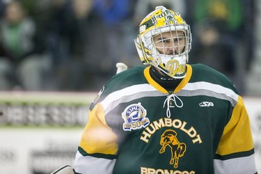 Humboldt Broncos goalie Dane Dow as his team takes on the Estevan Bruins in Warman, SK on Tuesday, September 25, 2018. The Broncos, who are rebuilding their team after 16 people died in an April 6 bus crash beat the Estevan Bruins 6-2 Tuesday at the Legends Centre in Warman. Humboldt is now 3-2, as is Estevan. The SJHL wraps up its four-day series of games in Warman with two contests Wednesday: Nipawin against Notre Dame at 11 a.m., and Humboldt against Melville at 2 p.m.