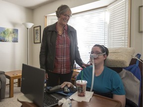 Erin Millikin, who has muscular dystrophy and left the provincial home care system in May, after six months of trying to get an answer to why her care had been reduced, right, and her mother Marilyn at their home in Saskatoon on Tuesday, Sept. 25, 2018. Millikin is now using the individualized funding option, which means she gets provincial funding directly to hire care staff.