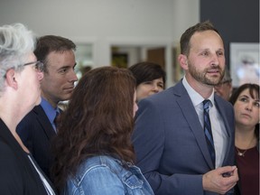 Flanked by members of the Saskatchewan NDP caucus, leader Ryan Meili announces new critic roles in Saskatoon on Tuesday, Sept. 25, 2018.