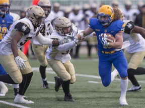 Saskatoon Hilltops running back Josh Ewanchyna runs the ball during the Prairie Football Conference final at SMF Field in Saskatoon,Sk on
Oct. 28, 2018.