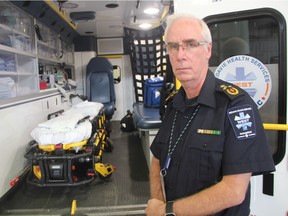 Gerry Schriemer, the Chief Operating Officer and Chief of EMS with Medavie Health Services West, stands with a Medavie Ambulance at the service's main office in Saskatoon's C.N. Industrial Neighbourhood on Sept. 26, 2018.