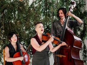 The latest tour for Raine Hamilton (centre) and her band will take her through Saskatoon on Oct. 6 and feature ASL interpreters for the deaf and hard of hearing community.