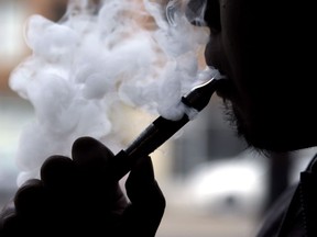 An electronic cigarette is demonstrated in Chicago on April 23, 2014.