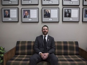 The head coach of the Humboldt Broncos says his team will push for seatbelt use on team buses after the deadly crash in the spring. New Humboldt Broncos coach and General Manger Nathan Oystrick sits for a portrait inside the Elgar Petersen Arena in Humboldt, Sask., Tuesday, July, 3, 2018.