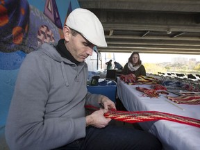 Scott Duffee with his demonstration of weaving a sache at the opening of Saskatoon's Culture Days under the Sid Buckwold Bridge, September 29, 2016.